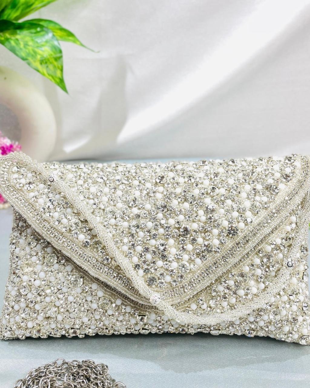 Sitara envelope clutch in ivory silver, hand-set with crystals and pearl beads